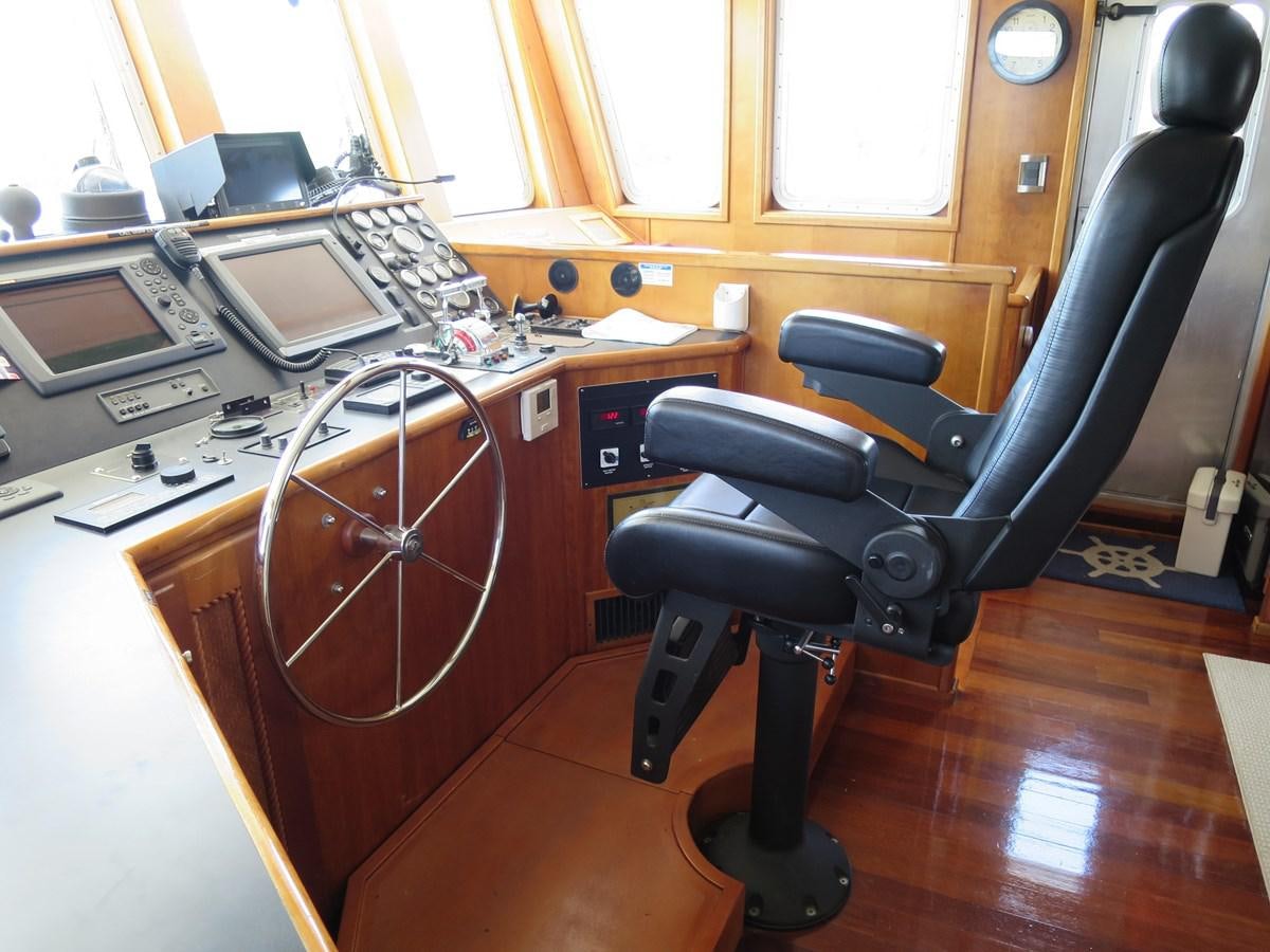 a chair in front of a desk aboard PATRICIA D Yacht for Sale