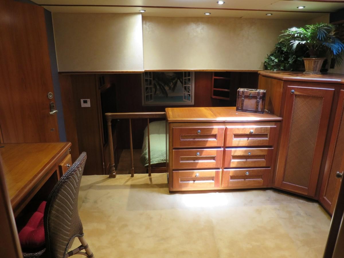 a room with a desk and chairs aboard PATRICIA D Yacht for Sale