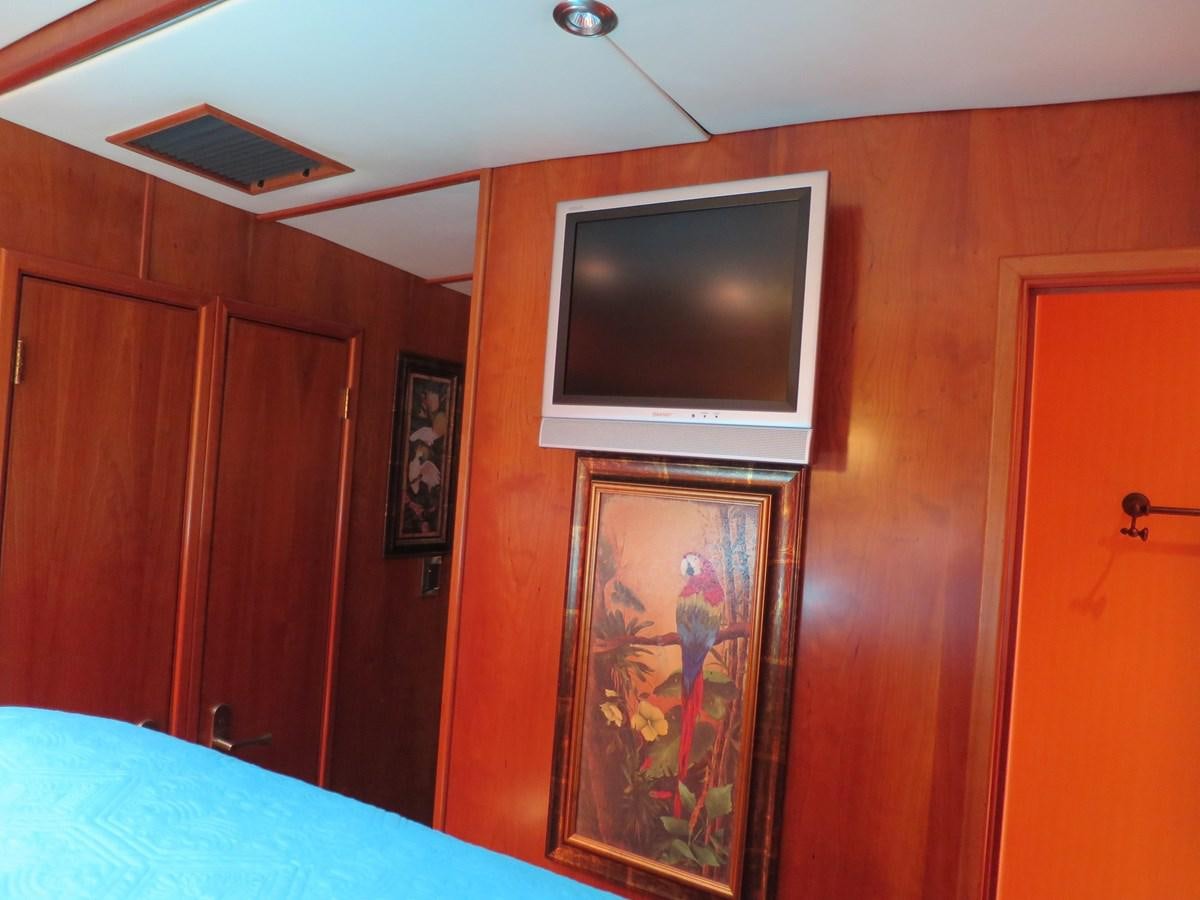 a television on a wall aboard PATRICIA D Yacht for Sale