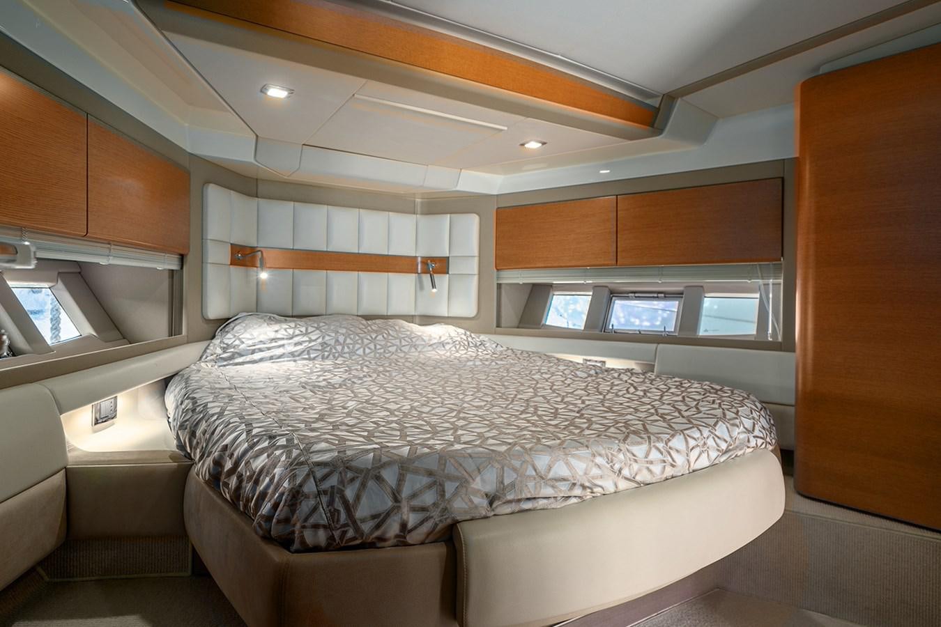 a bed in a room aboard ELENA I Yacht for Sale