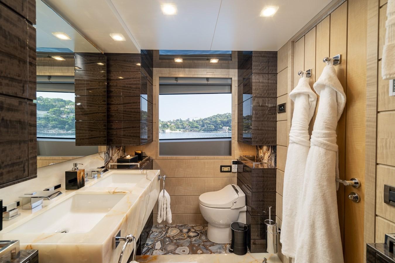 a bathroom with a towel on the wall aboard EDESIA Yacht for Sale