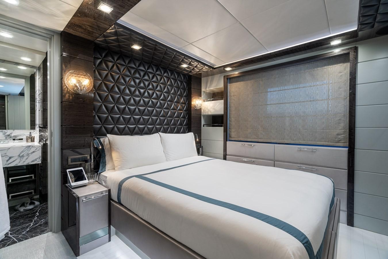 a bed in a room aboard EDESIA Yacht for Sale