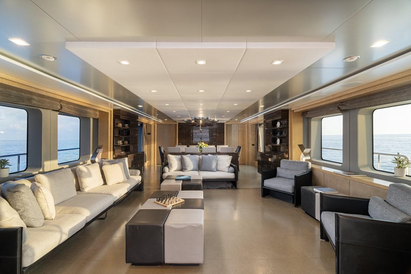 a living room with a large window aboard EDESIA Yacht for Sale