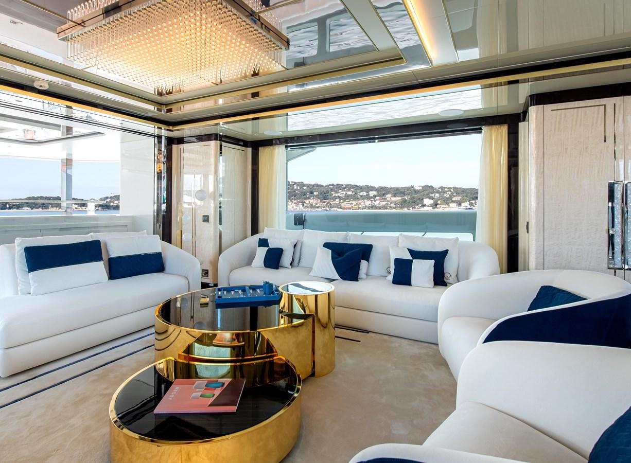 a living room with a large window aboard STEFANIA Yacht for Sale