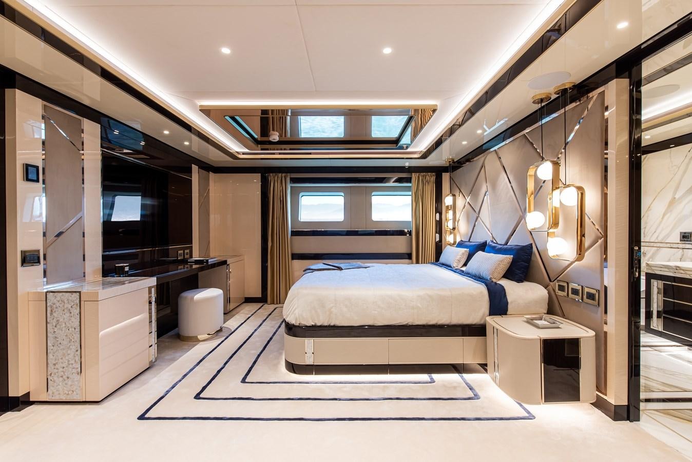 a room with a couch and a tv aboard STEFANIA Yacht for Sale