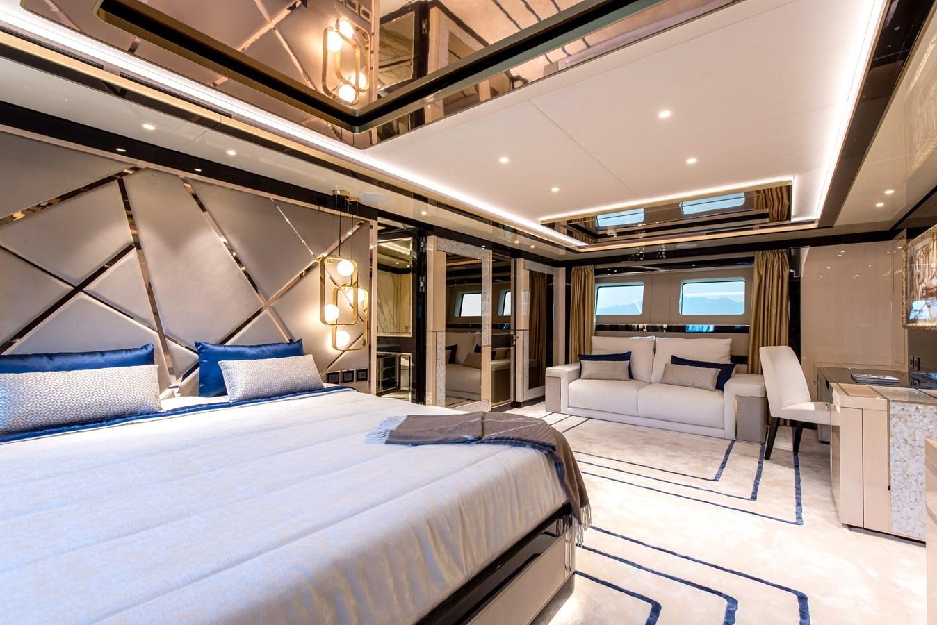 a room with a bed and a couch aboard STEFANIA Yacht for Sale