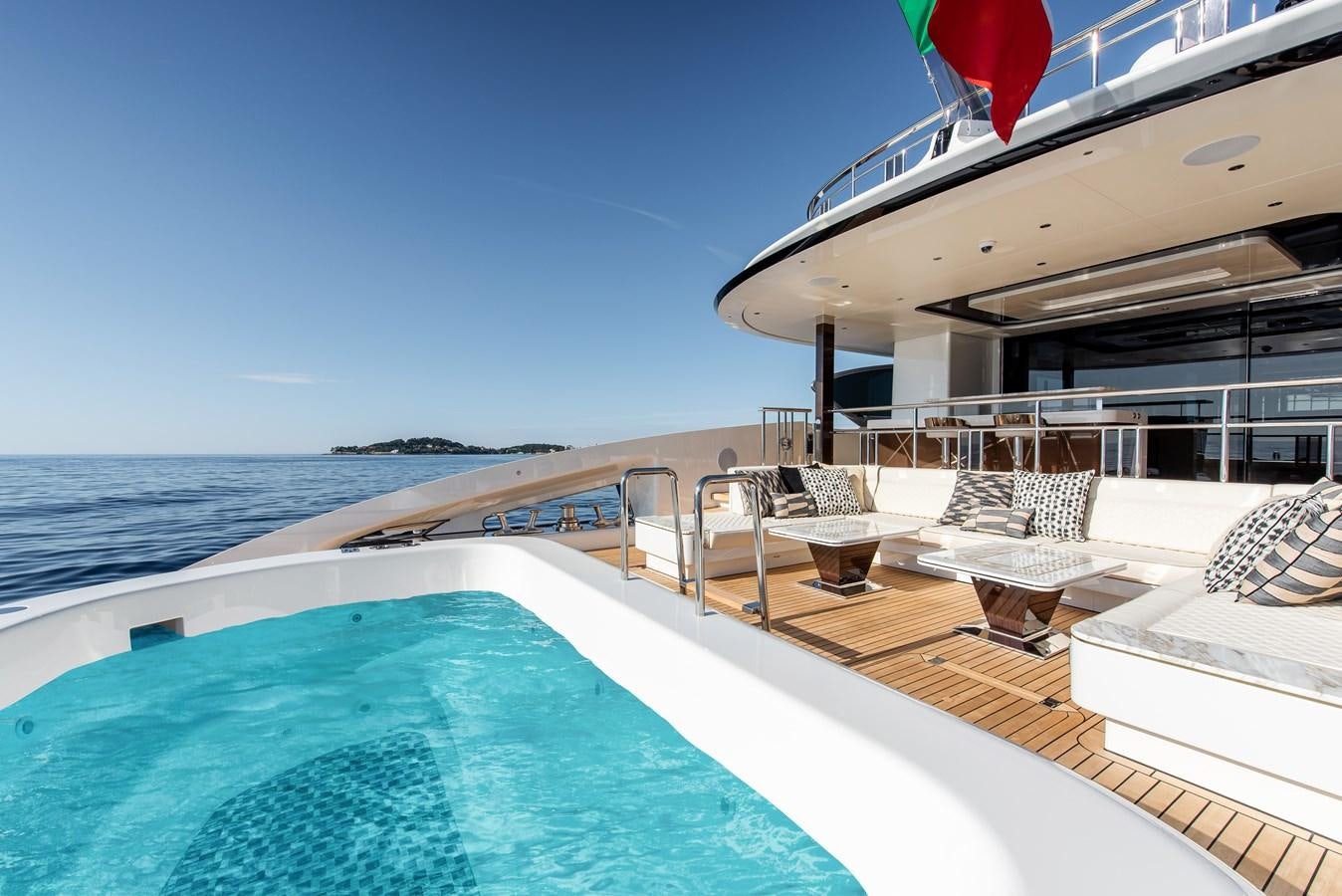 a large white boat on a body of water aboard STEFANIA Yacht for Sale