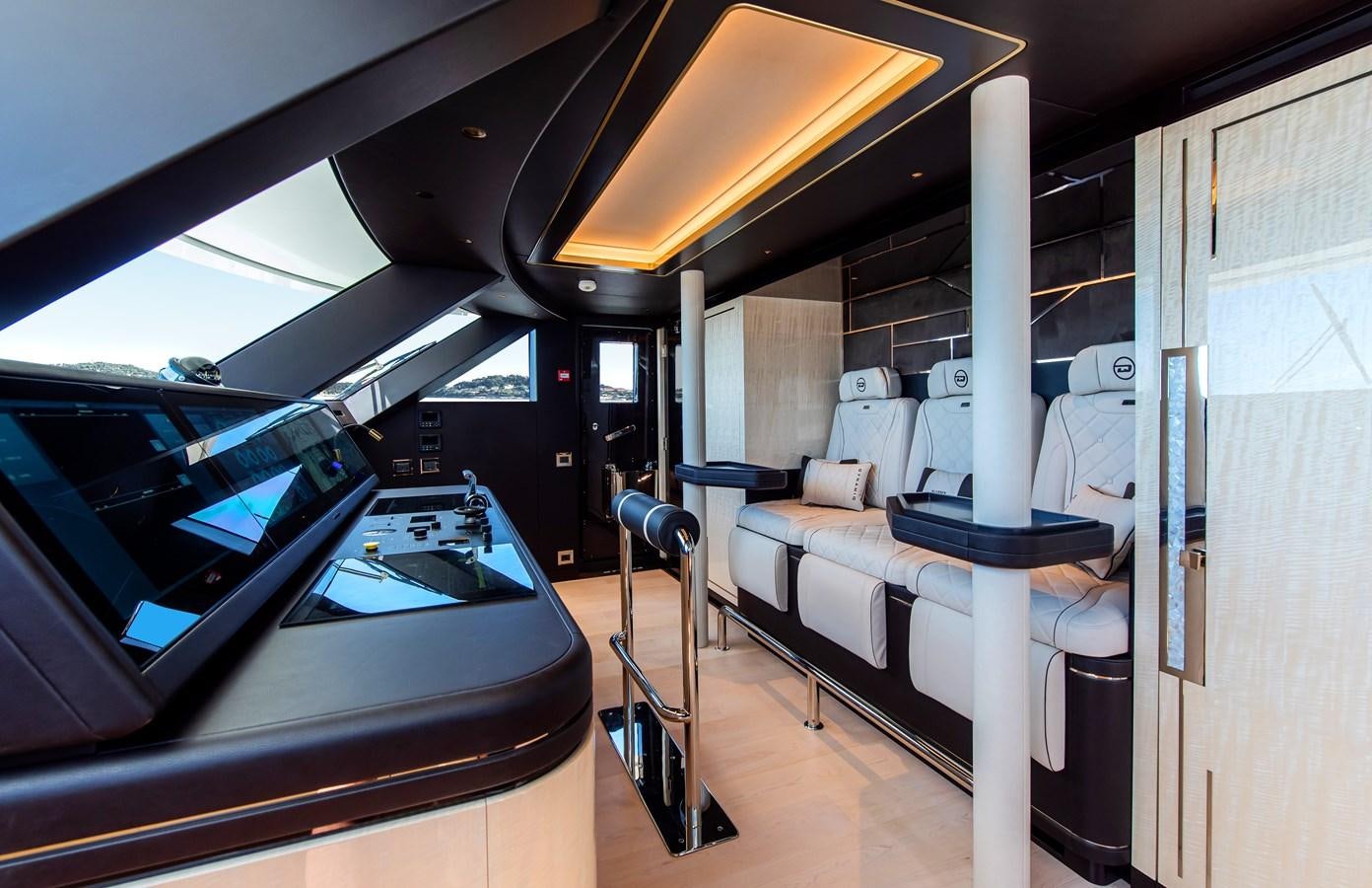 a room with a bed and a desk aboard STEFANIA Yacht for Sale