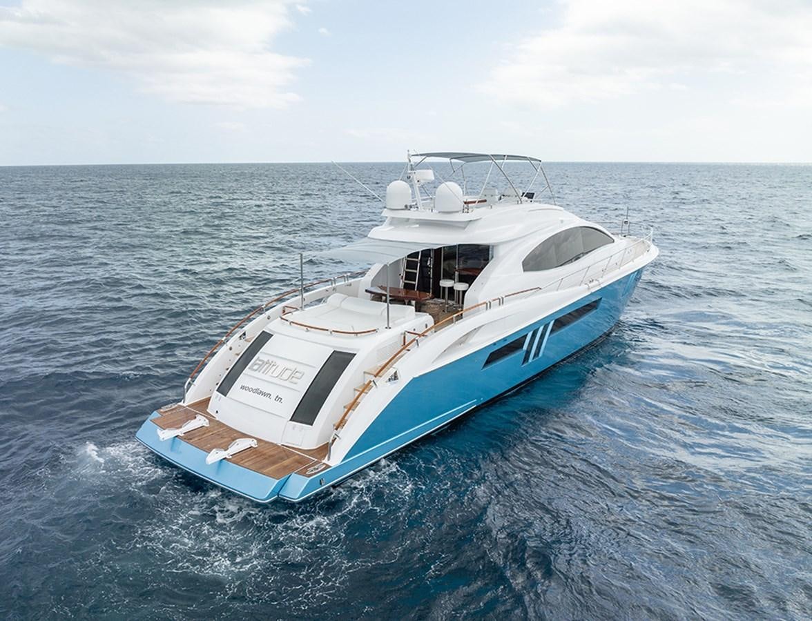 a white boat in the water aboard LATITUDE Yacht for Sale