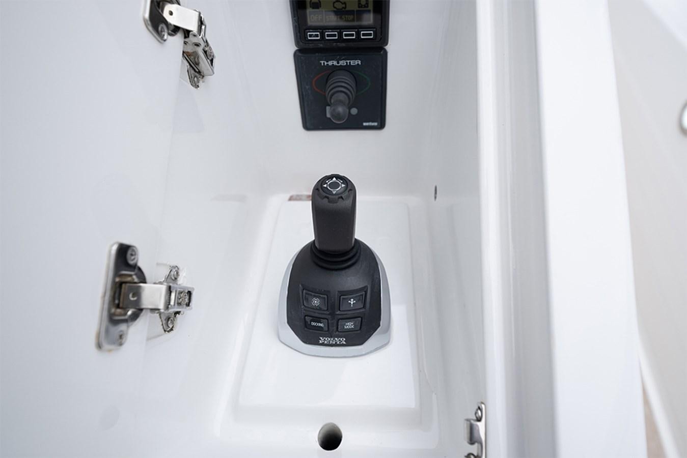 a white machine with a black cap aboard LATITUDE Yacht for Sale