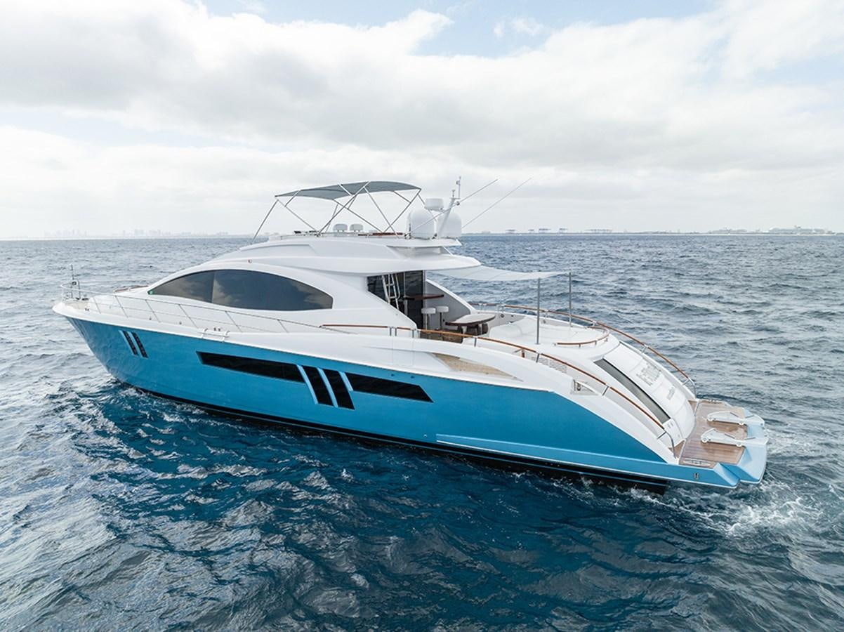 a white boat in the water aboard LATITUDE Yacht for Sale