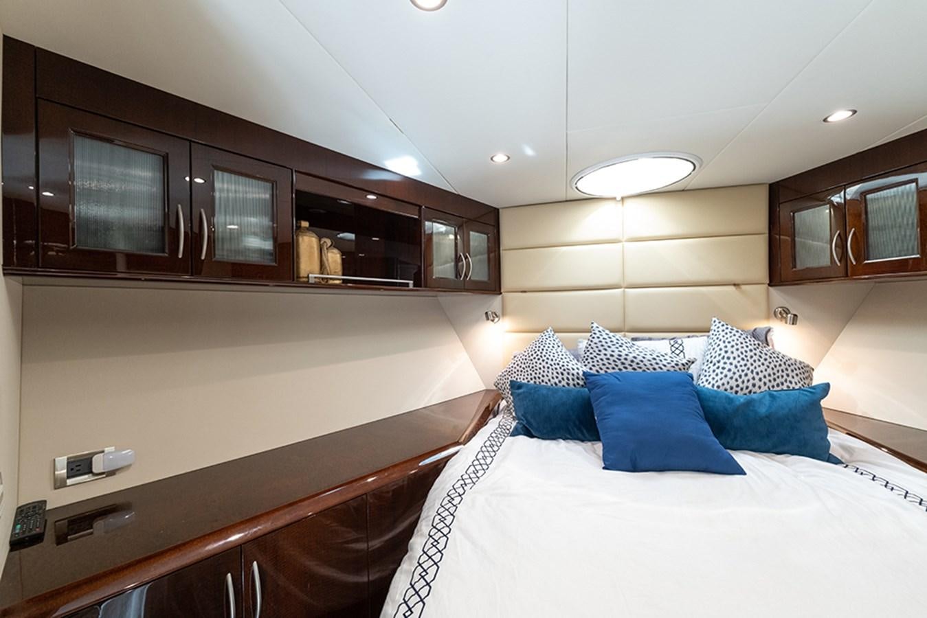 a modern looking bedroom aboard LATITUDE Yacht for Sale