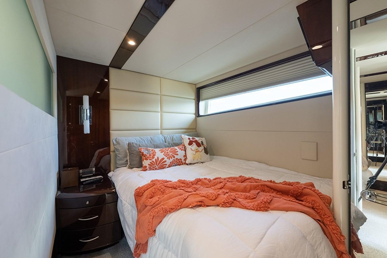 a bed in a room aboard LATITUDE Yacht for Sale