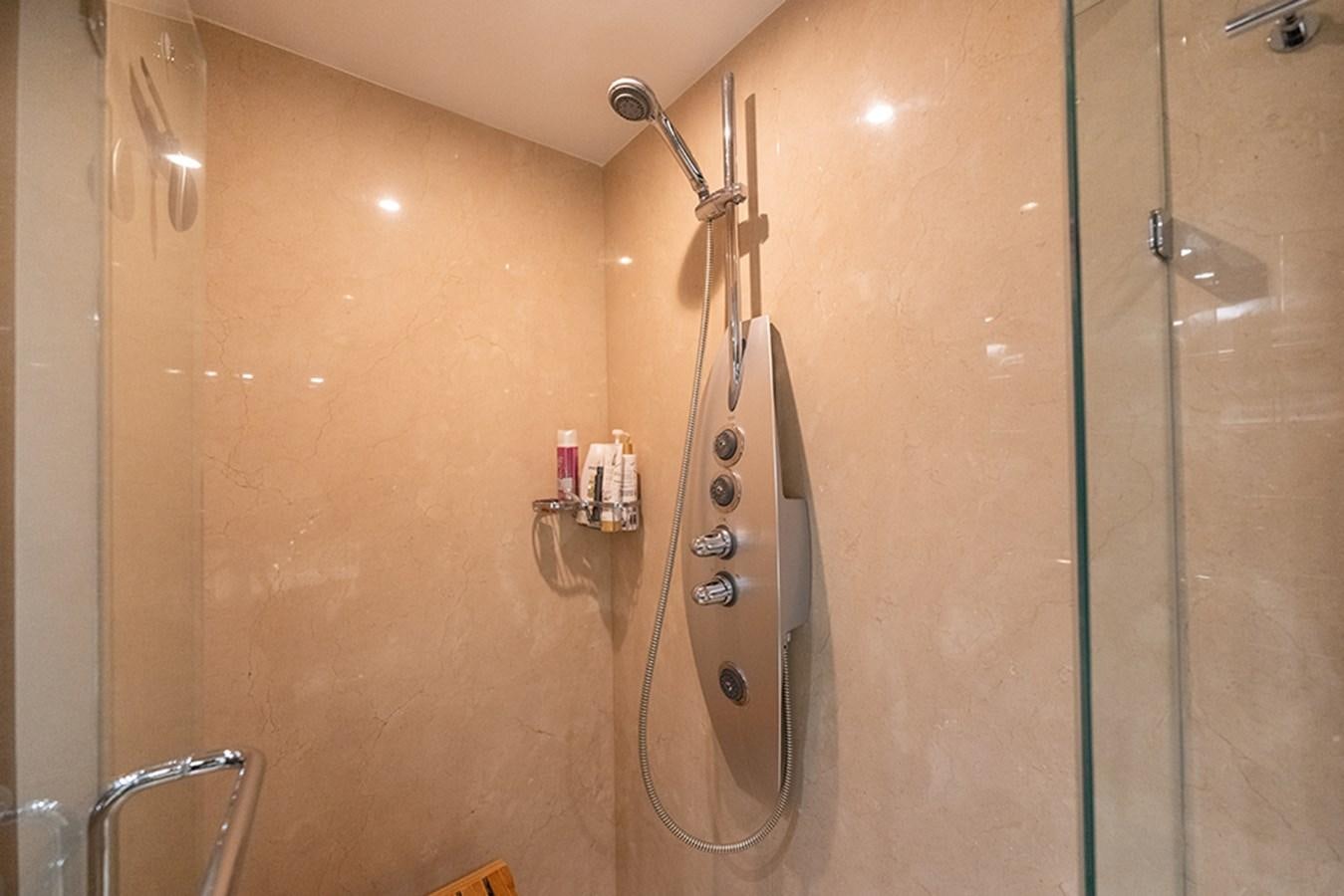 a shower with a glass door aboard LATITUDE Yacht for Sale