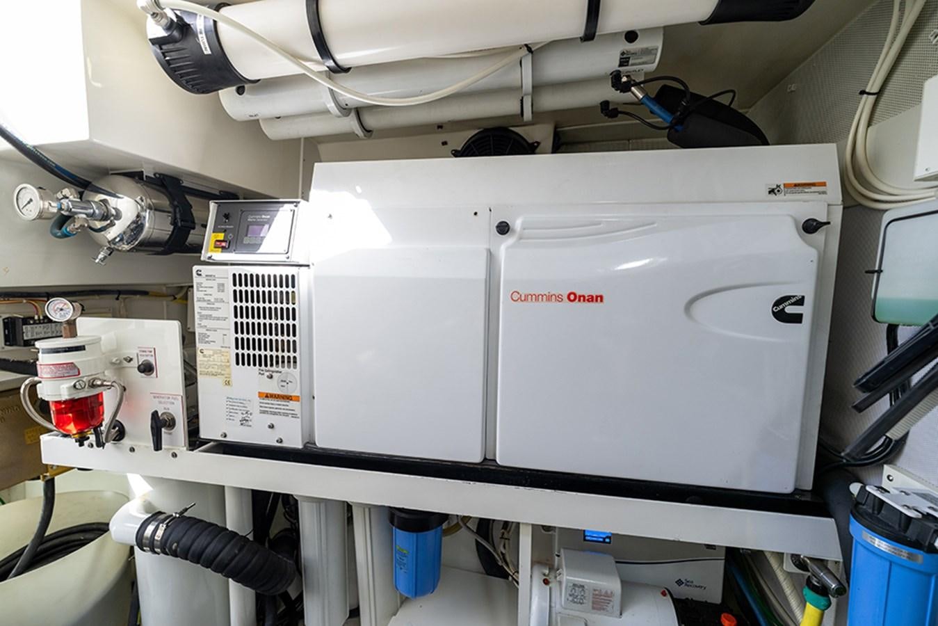 a machine with a piece of paper on the side aboard LATITUDE Yacht for Sale