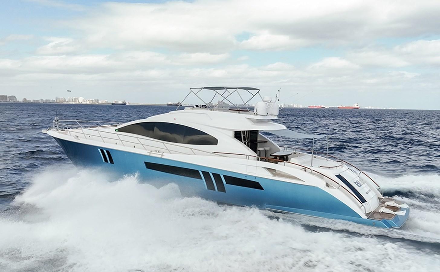 a white yacht on the water aboard LATITUDE Yacht for Sale