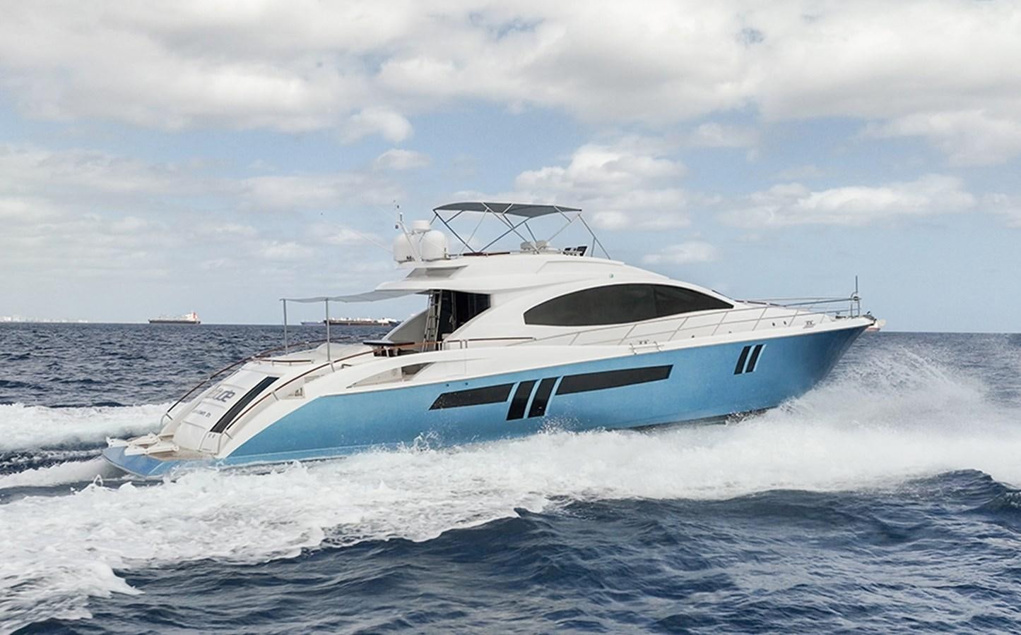 a white yacht on the water aboard LATITUDE Yacht for Sale