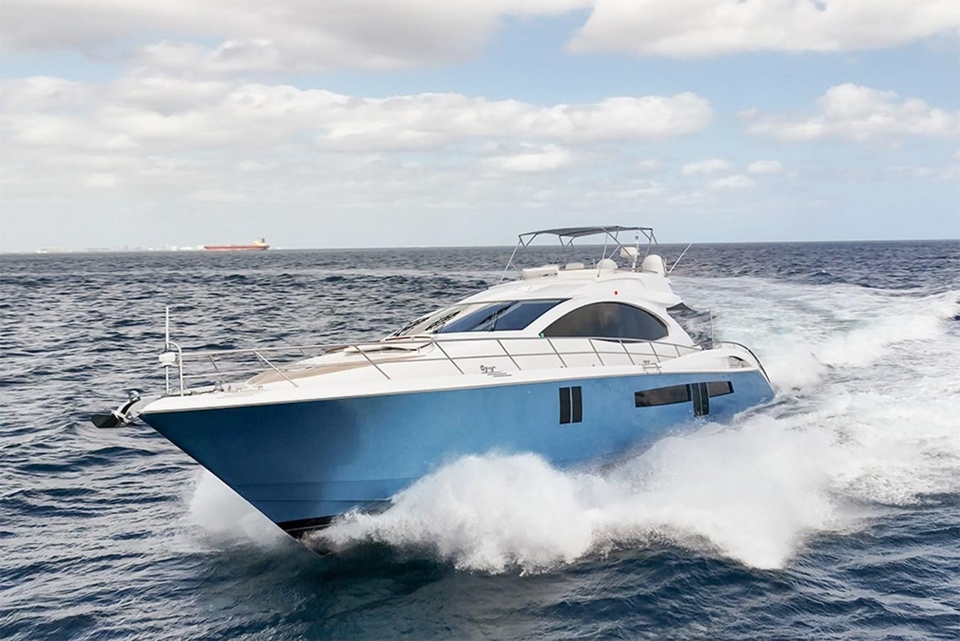 a white yacht on the water aboard LATITUDE Yacht for Sale