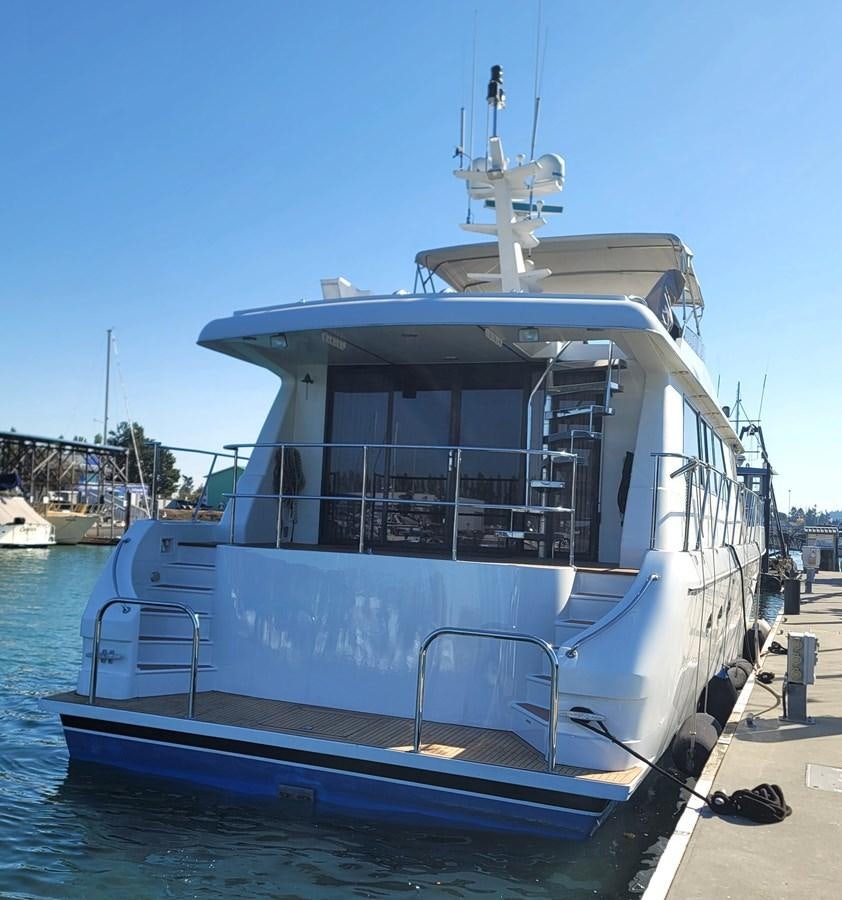 a boat docked at a pier aboard AUDRE GRACE Yacht for Sale