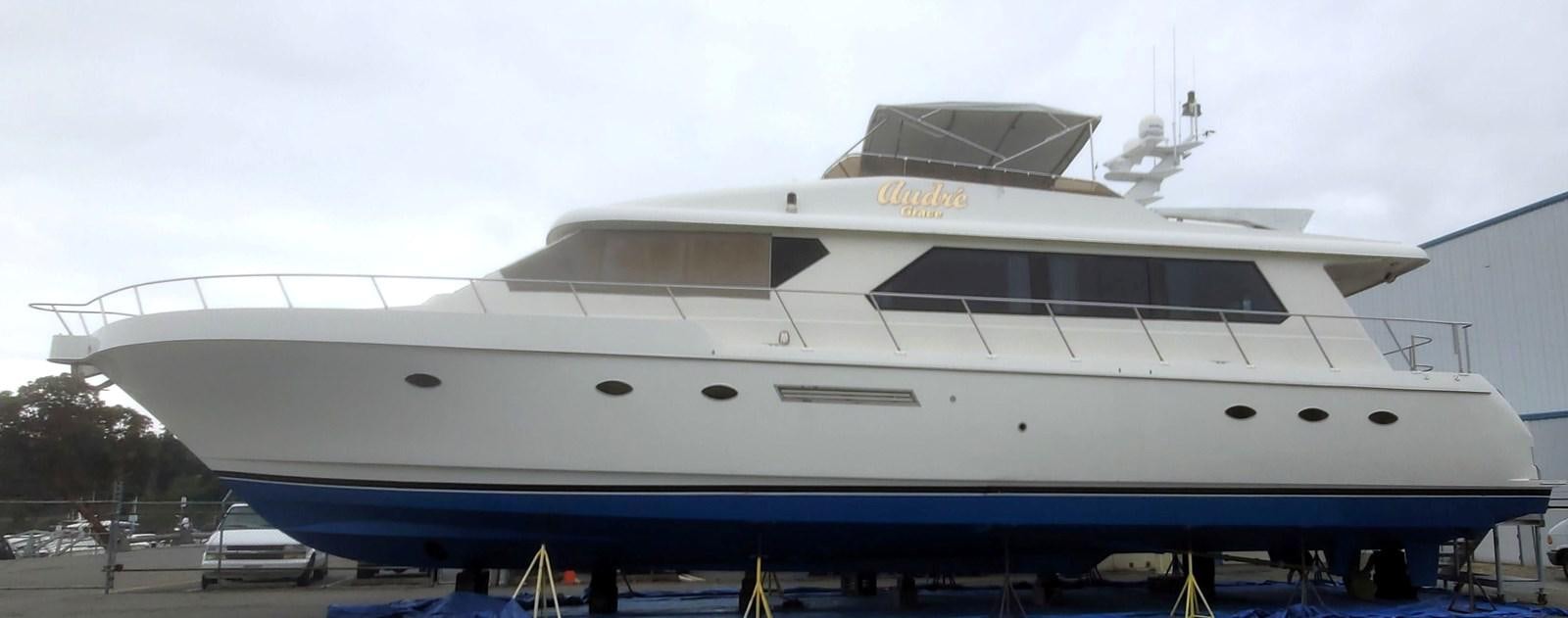 a large white boat aboard AUDRE GRACE Yacht for Sale