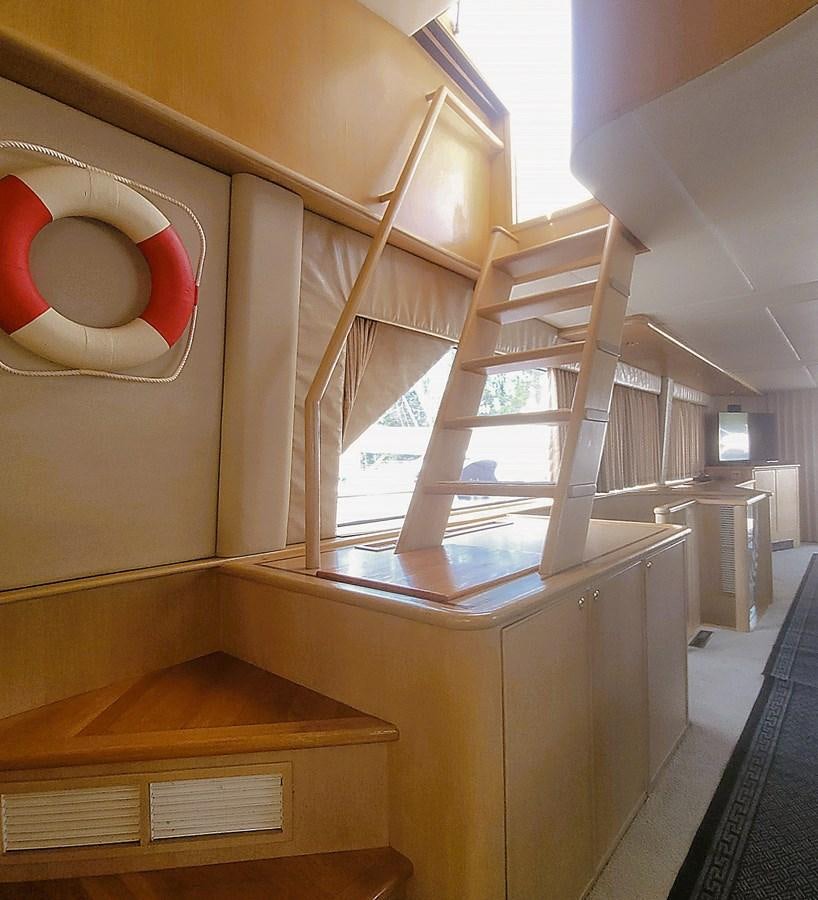 a staircase with red circles aboard AUDRE GRACE Yacht for Sale