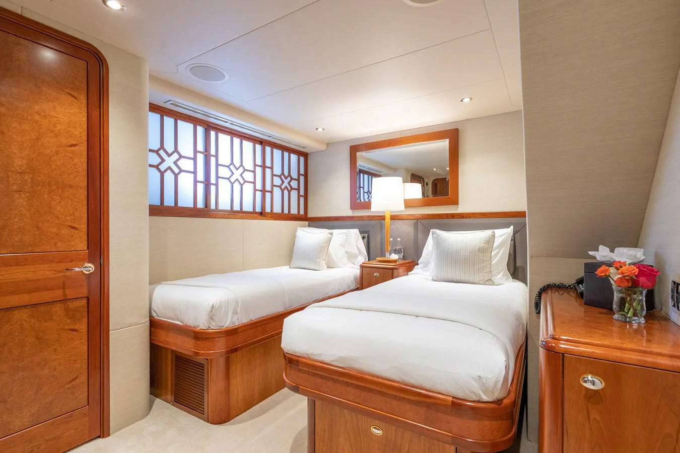 a room with two beds aboard DONA LOLA Yacht for Sale