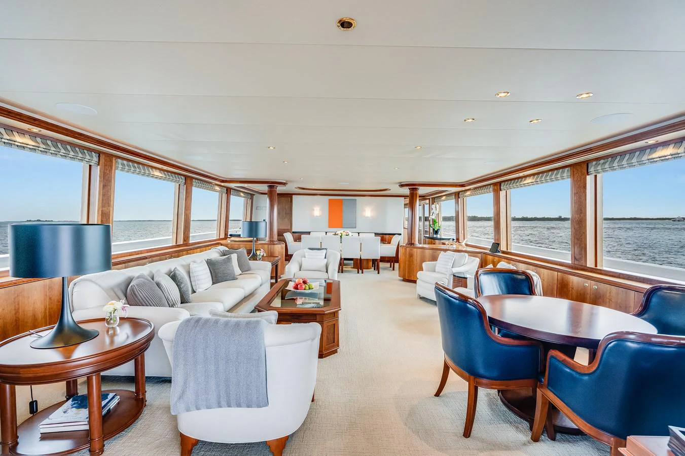 a living room with a large window aboard DONA LOLA Yacht for Sale