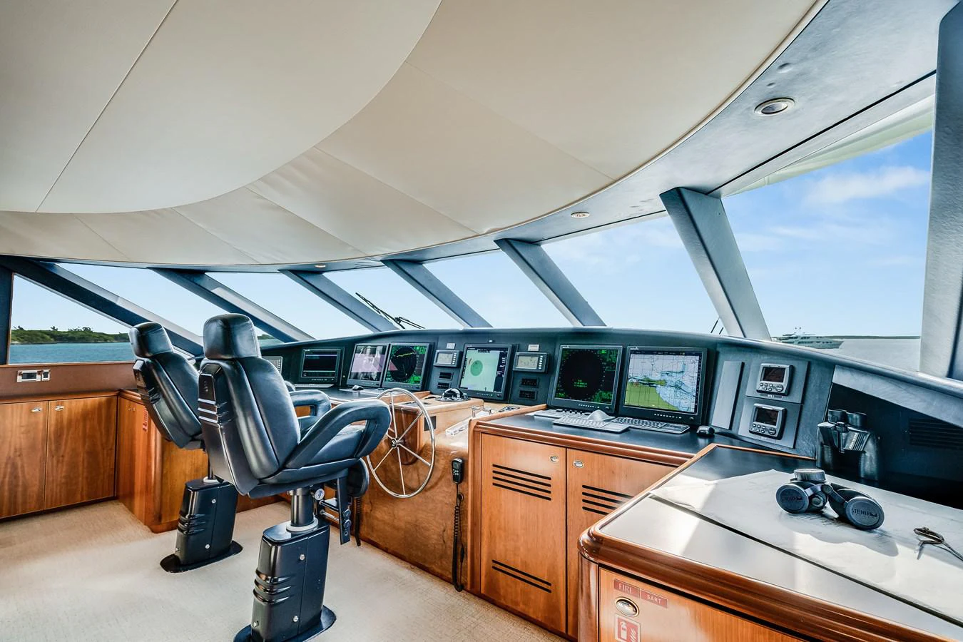 a room with a desk and computer aboard DONA LOLA Yacht for Sale