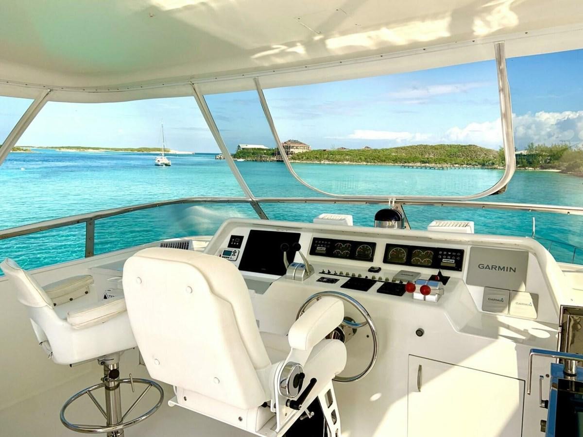 a boat on the water aboard BEING OFFERED ON A 50% PARTNERSHIP BASIS - CHASER Yacht for Sale