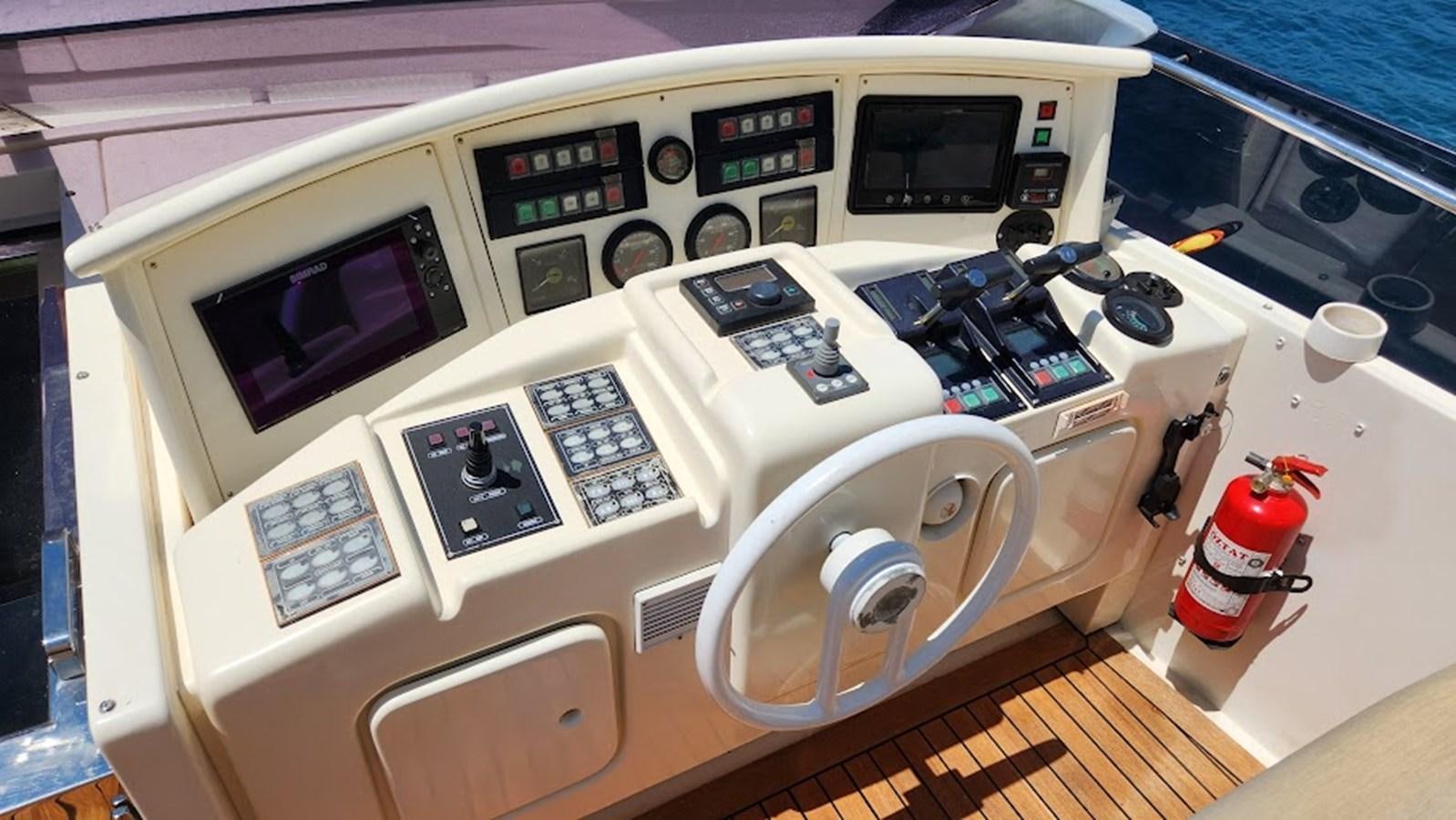 a machine with buttons and a screen aboard THE ONE Yacht for Sale