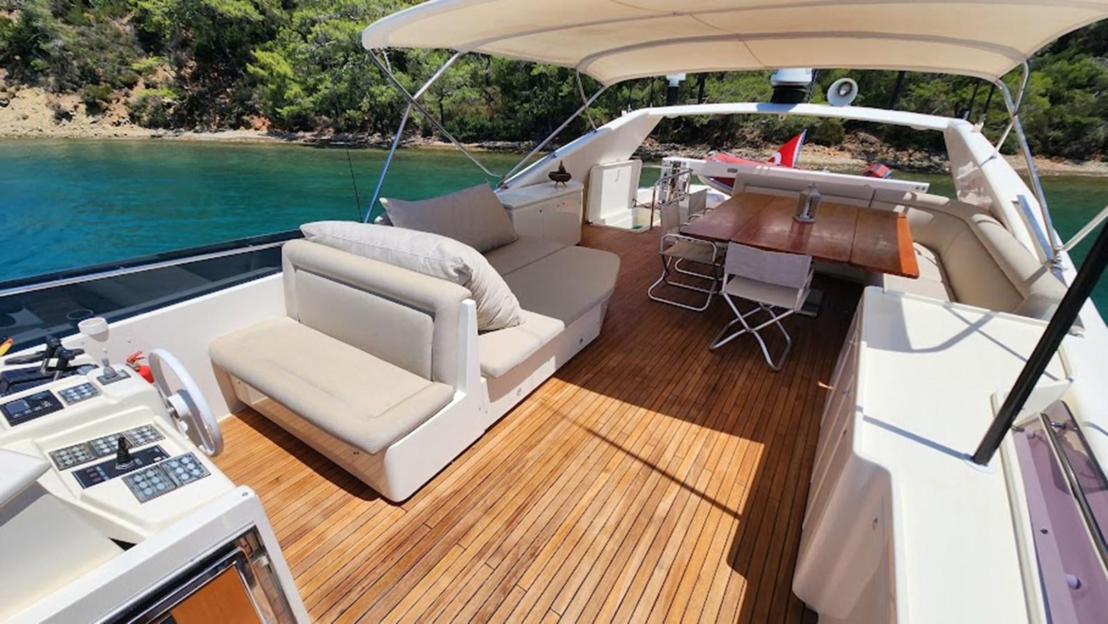 a boat on a deck aboard THE ONE Yacht for Sale