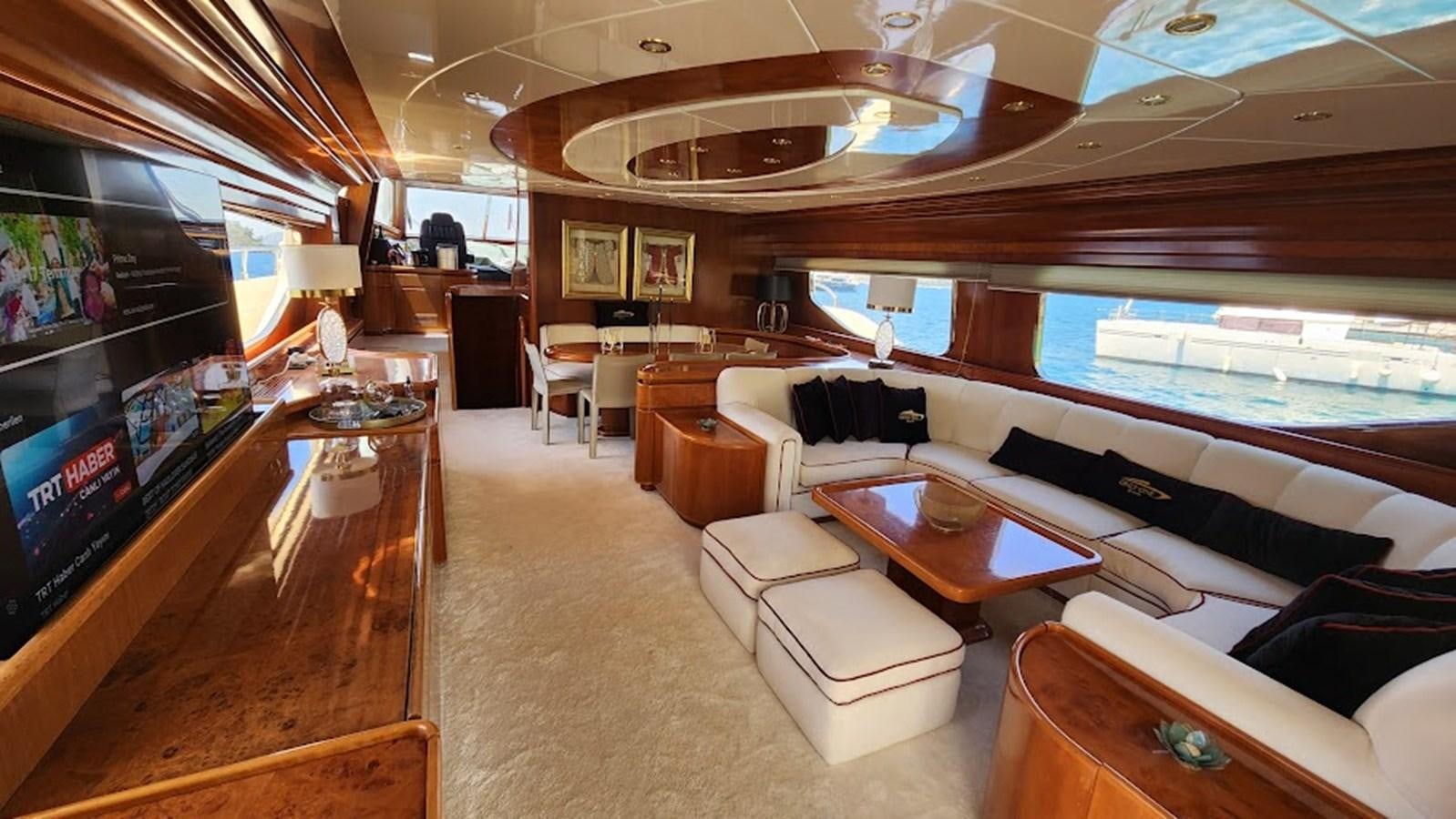 a living room with a large window aboard THE ONE Yacht for Sale