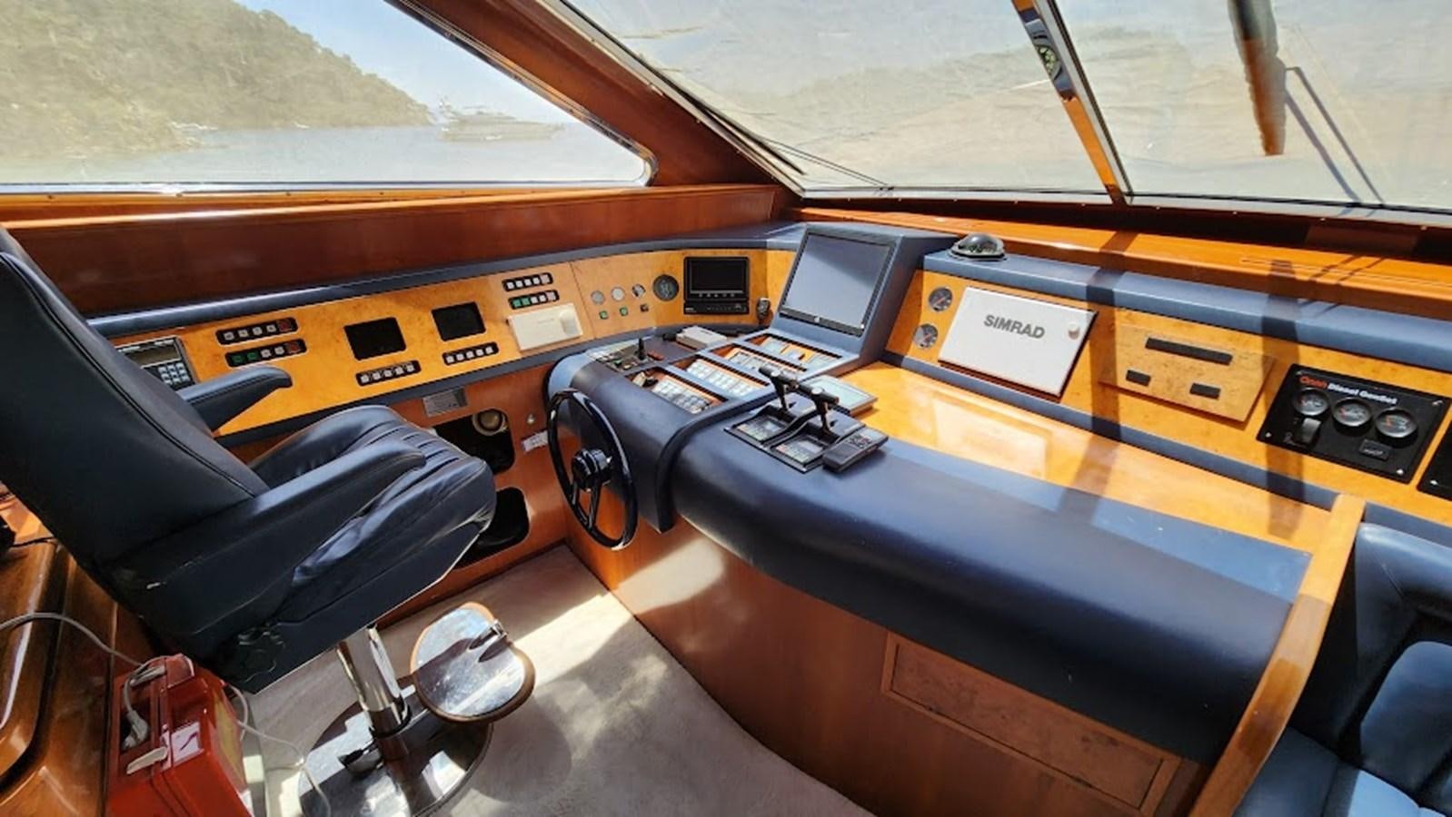 a black and orange video game console aboard THE ONE Yacht for Sale