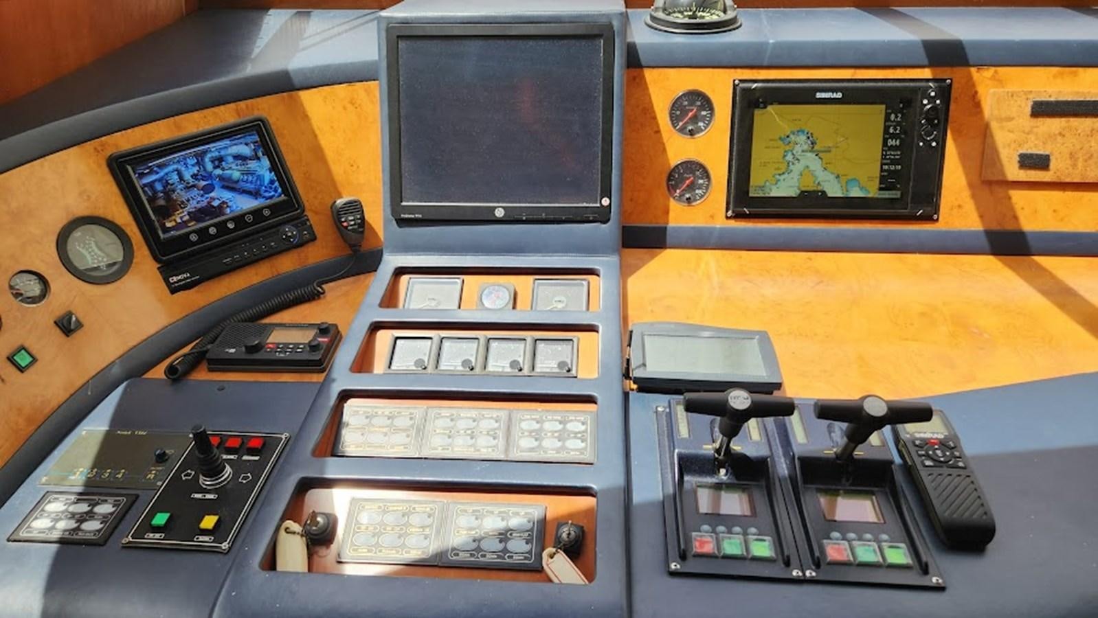 a group of electronic devices aboard THE ONE Yacht for Sale