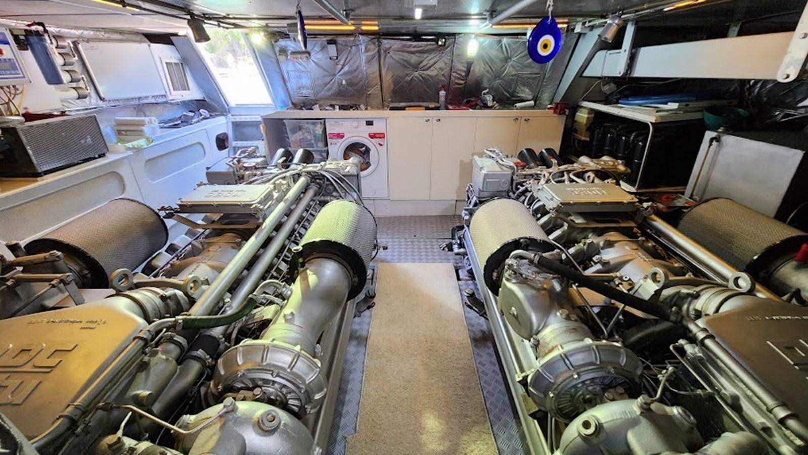 a room full of cars aboard THE ONE Yacht for Sale