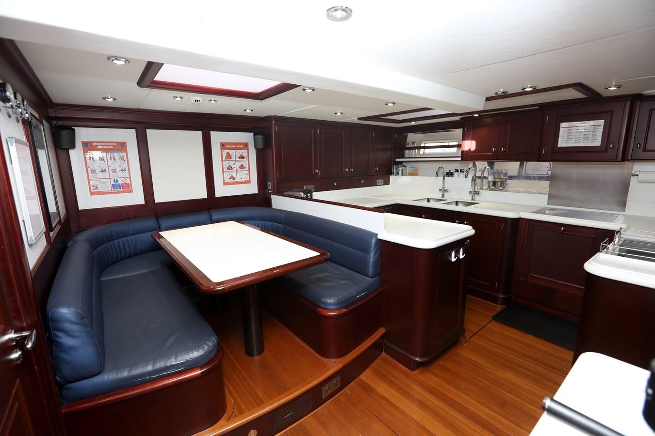 a kitchen with a bar and a bar aboard SOJANA Yacht for Sale