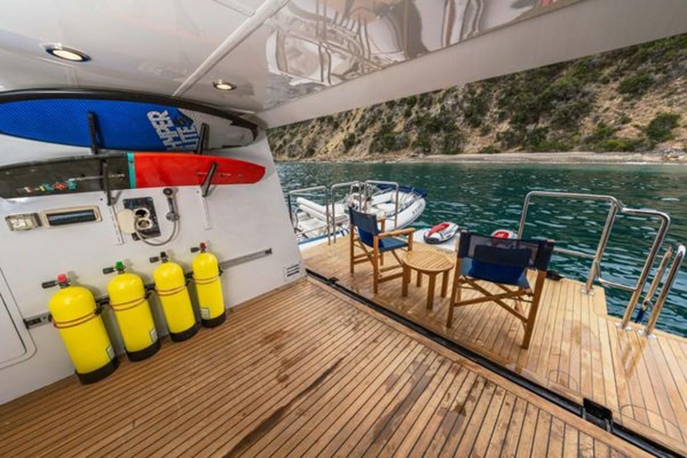 a boat on a deck aboard 2003 BAGLIETTO 38M FAST FLY Yacht for Sale