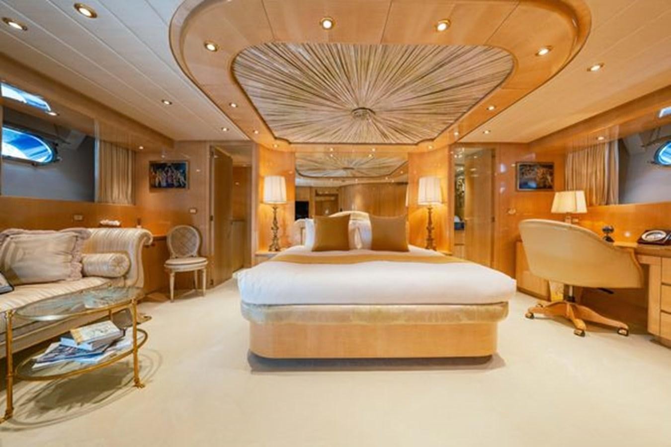 a large bedroom with a large bed aboard 2003 BAGLIETTO 38M FAST FLY Yacht for Sale