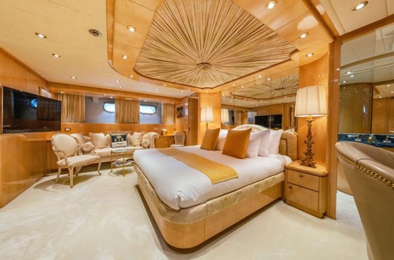 a large bedroom with a large bed aboard 2003 BAGLIETTO 38M FAST FLY Yacht for Sale
