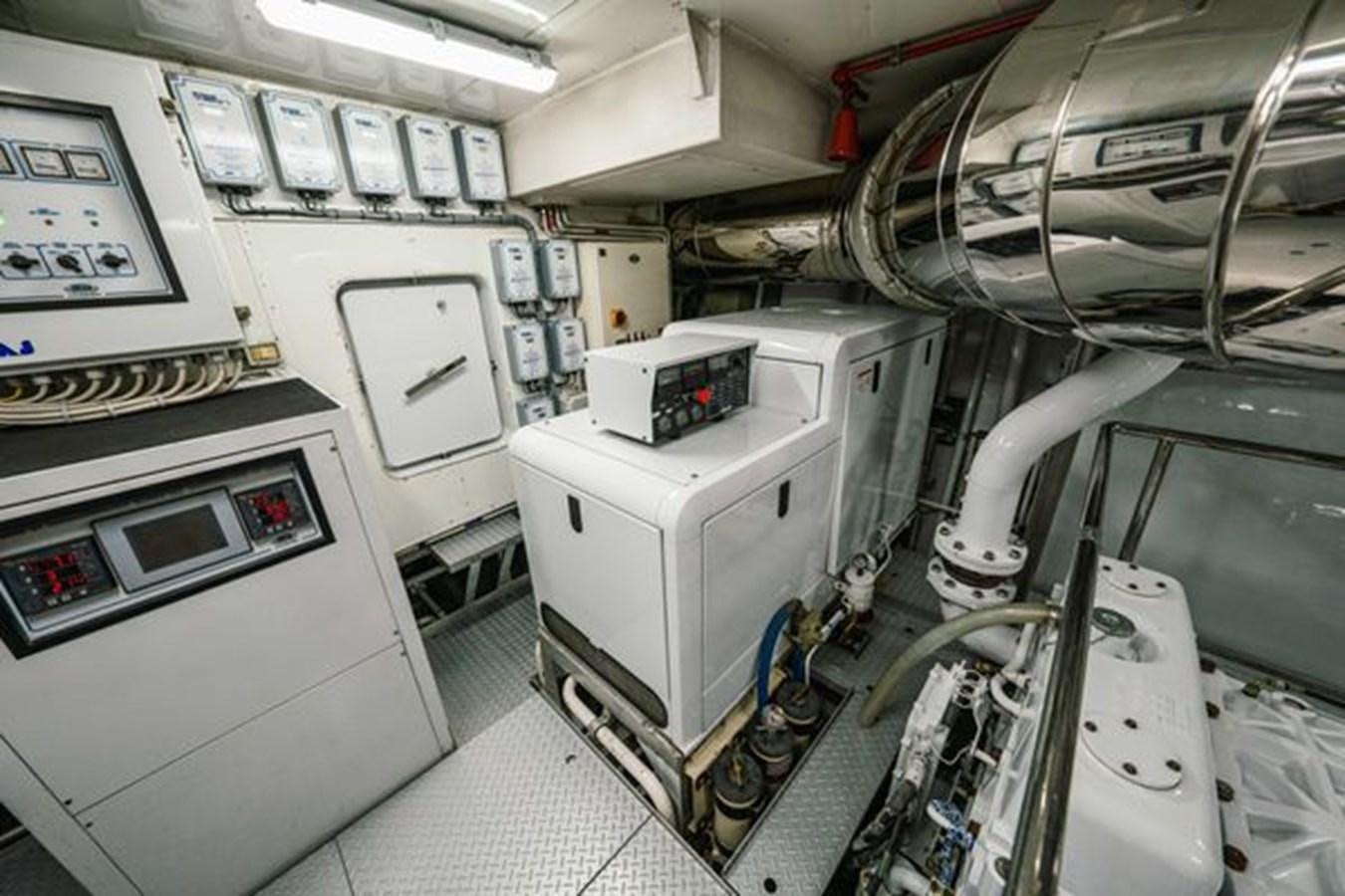 a room with several machines aboard 2003 BAGLIETTO 38M FAST FLY Yacht for Sale