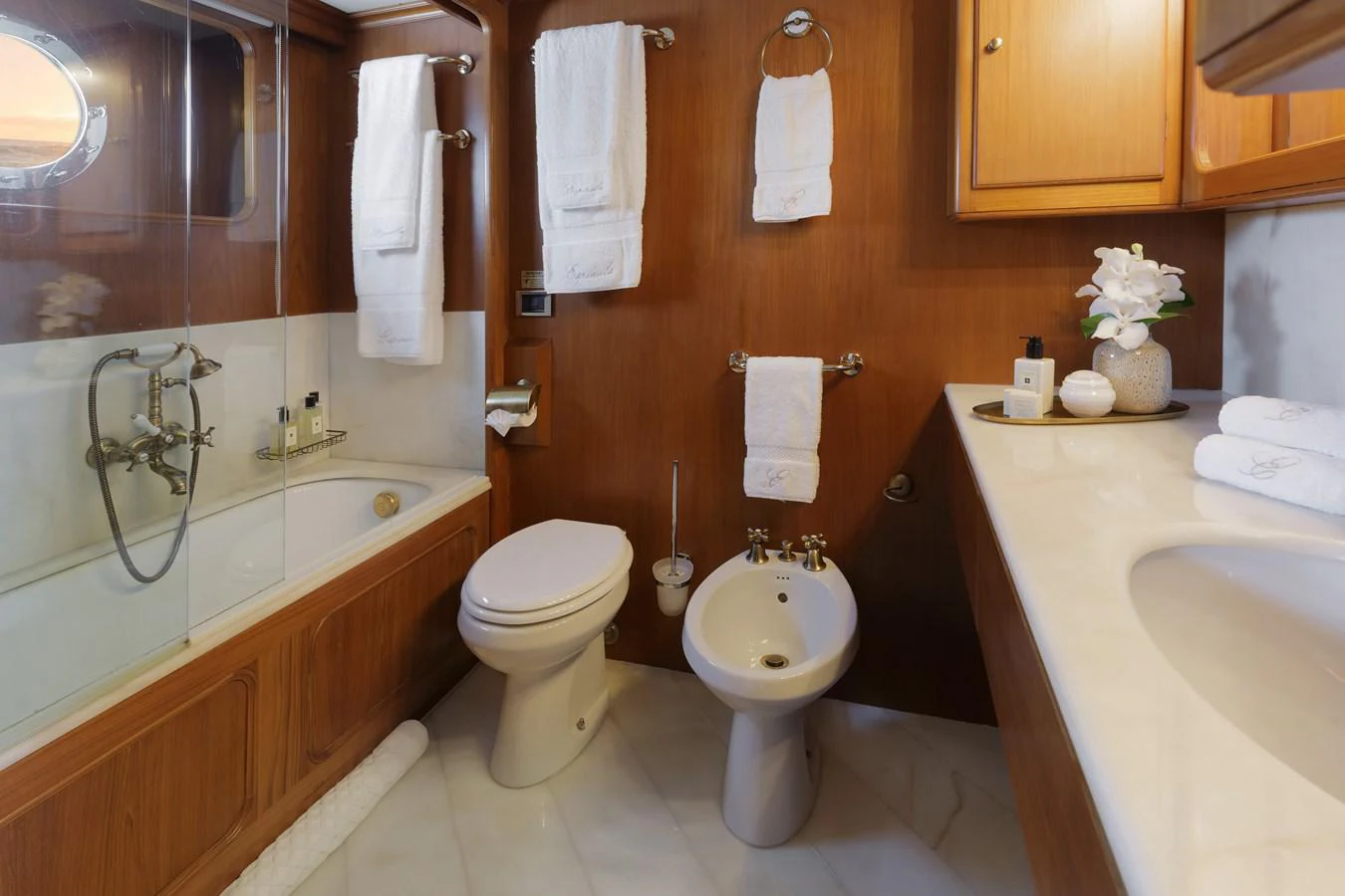 a bathroom with a toilet sink and a bathtub aboard ESPINOLA Yacht for Sale