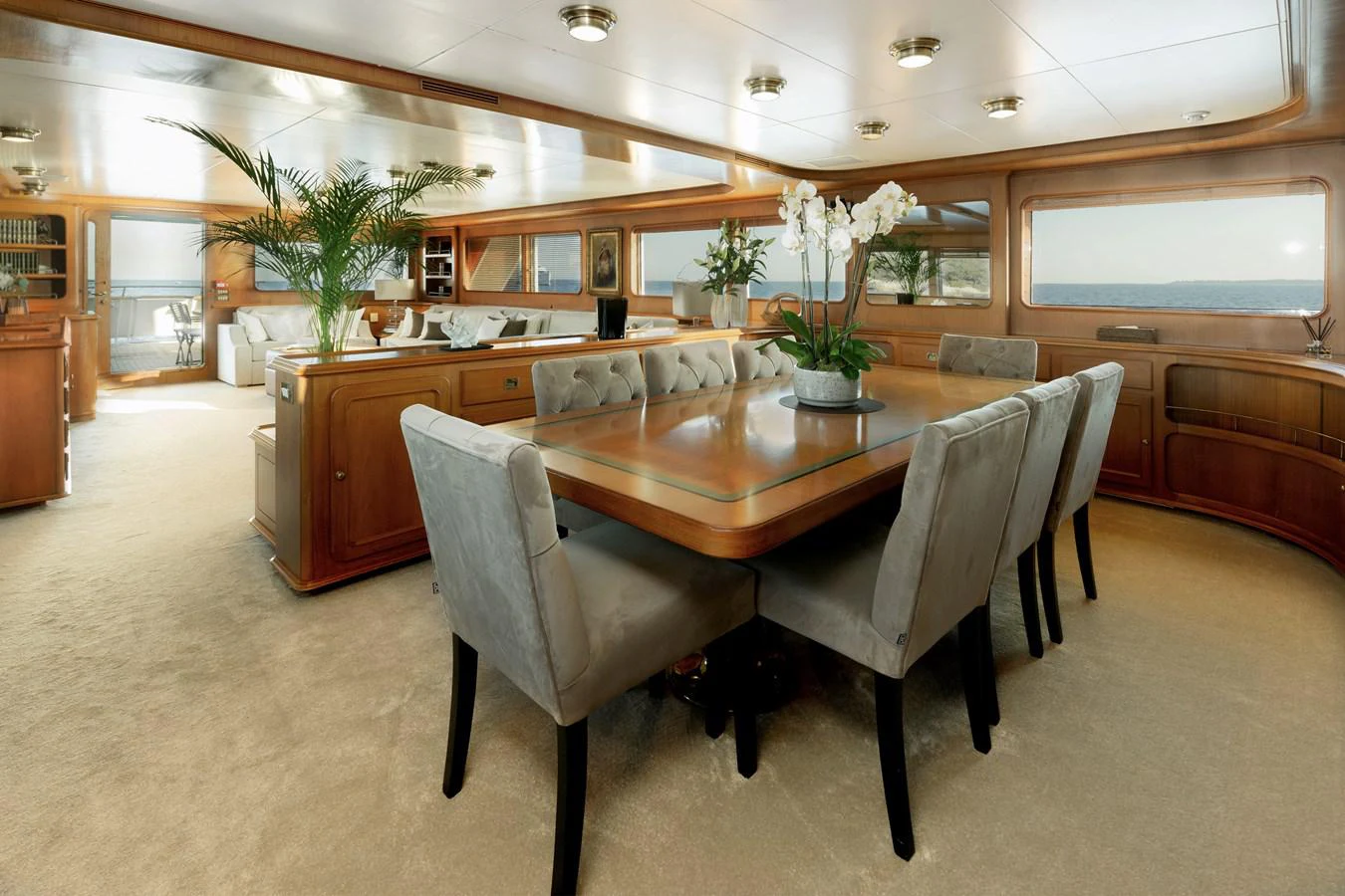 a large room with a table and chairs aboard ESPINOLA Yacht for Sale