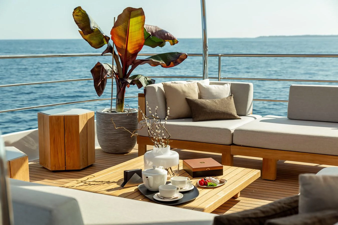 a living room with a large window overlooking the ocean aboard ESPINOLA Yacht for Sale