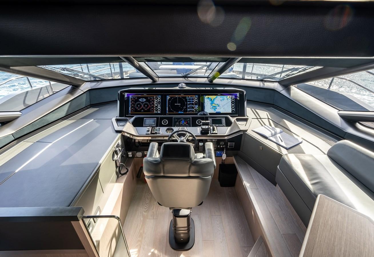 inside of a car aboard MAJIC Yacht for Sale