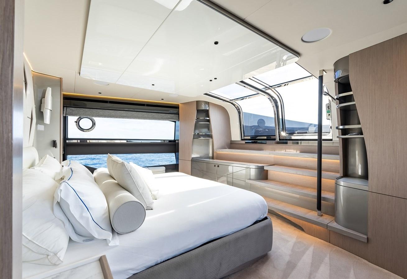 a bed in a room aboard MAJIC Yacht for Sale