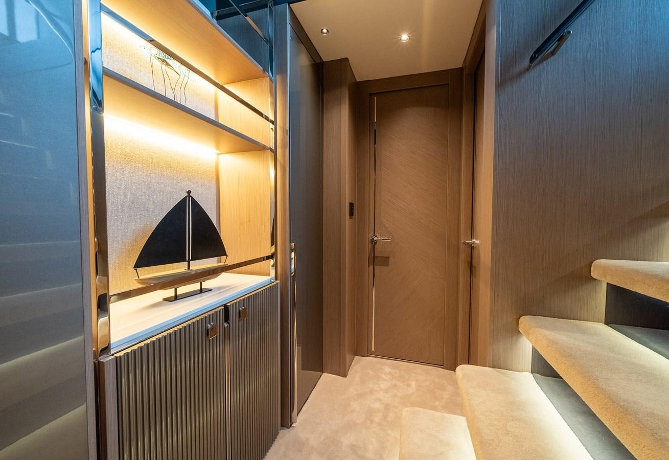 a room with a bed and a tv aboard MAJIC Yacht for Sale