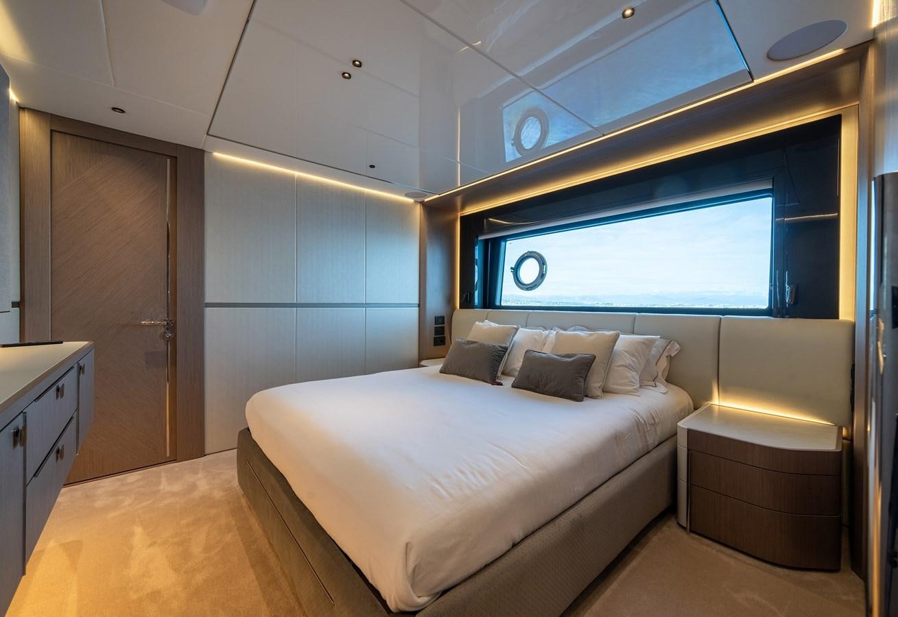 a bed in a room aboard MAJIC Yacht for Sale