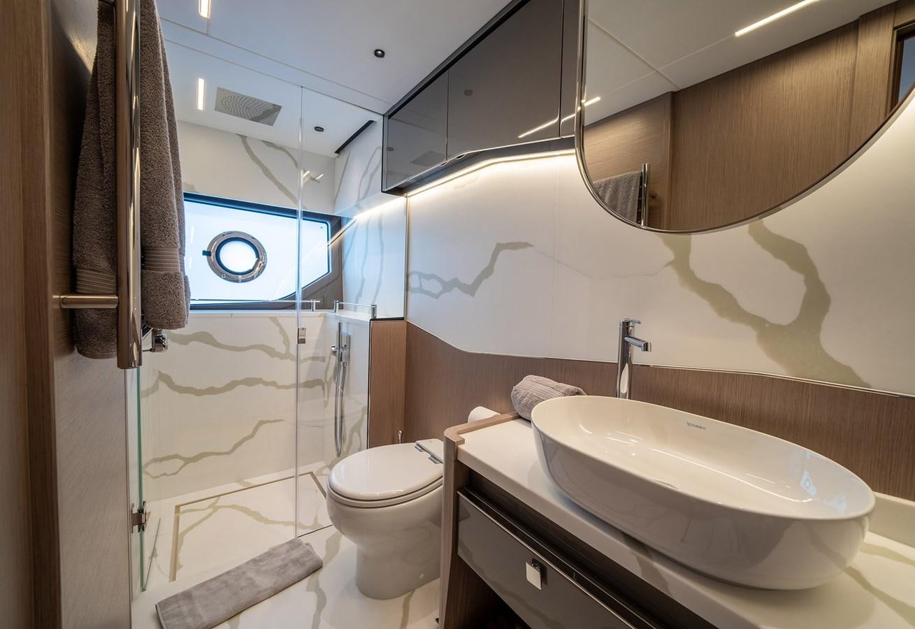 a bathroom with a sink and toilet aboard MAJIC Yacht for Sale