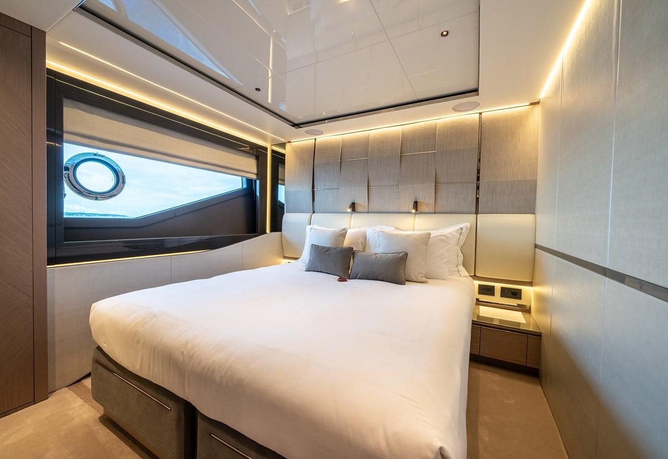 a bed in a room aboard MAJIC Yacht for Sale