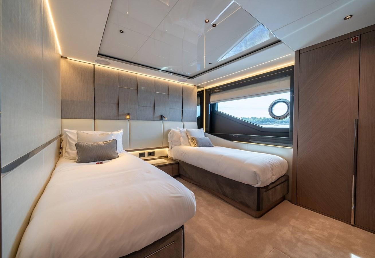a room with two beds aboard MAJIC Yacht for Sale